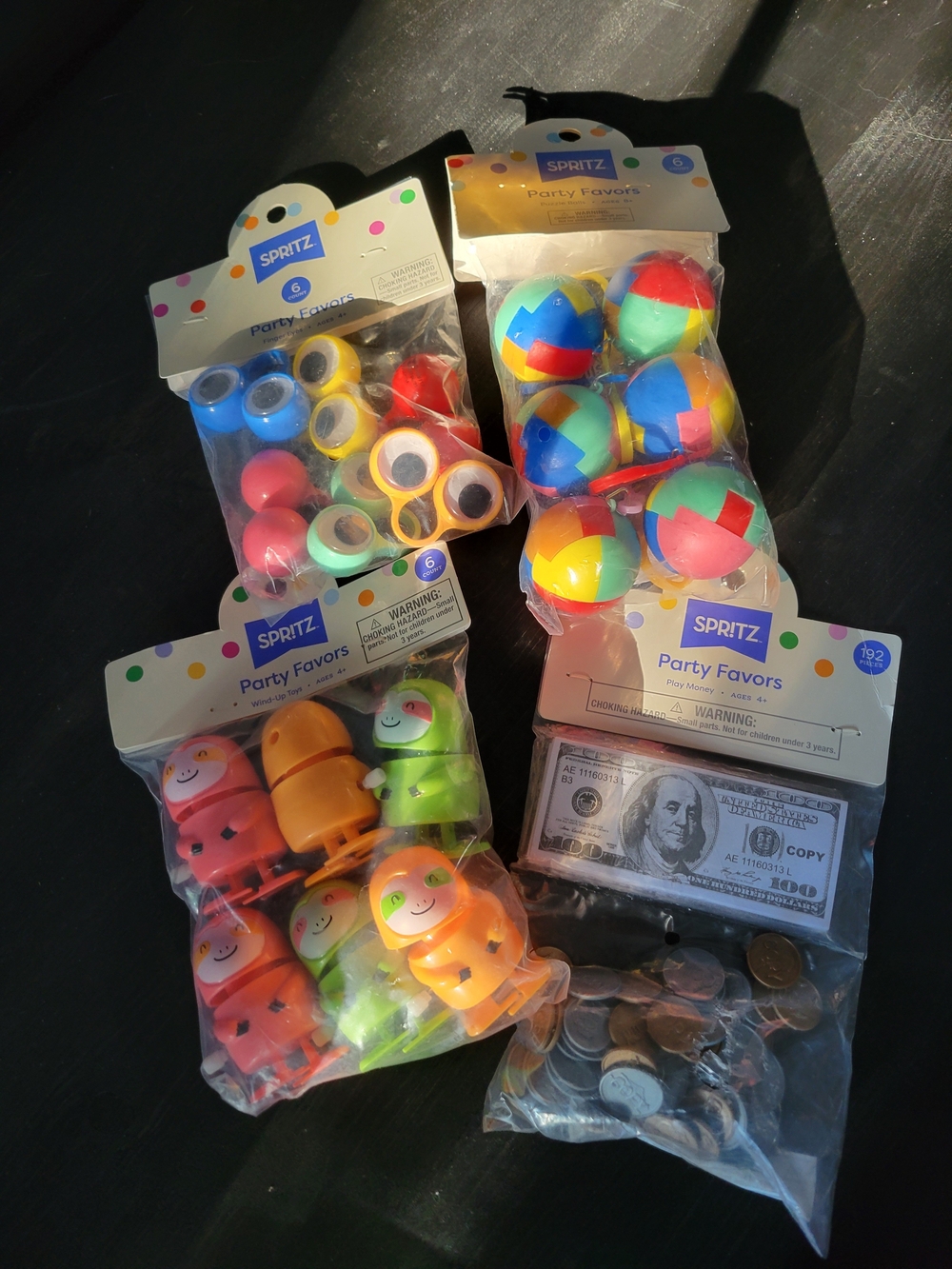 Spritz Multicolor Party Favors Pack with Balls, Rings, Coins, and Smile Toys